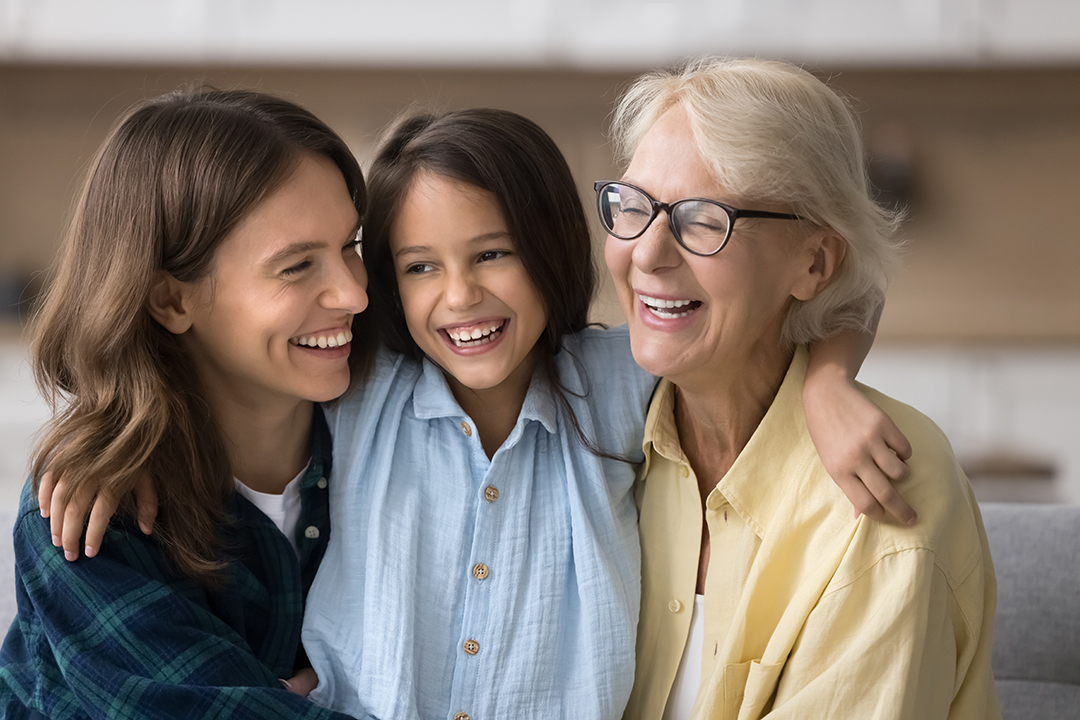 Happy child with mom and grand-mom